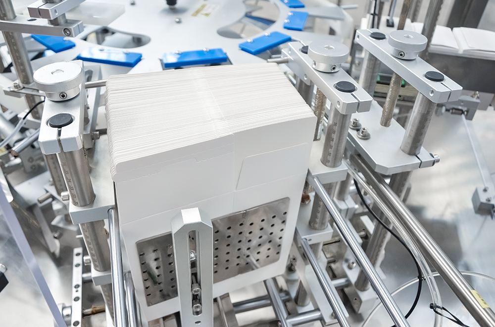 3.-Cardboard-leaflet-feeding 3.-Alimentación-de-folletos-de-cartón