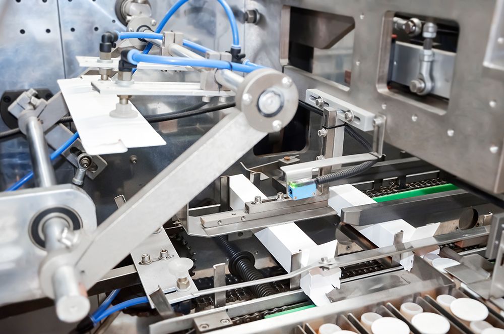 5.-Encartonado-de-c&aacute;psulas-empuje-en-cajas